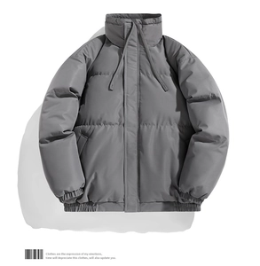 Detailed view of dark grey padded jacket featuring a stand collar with thick cotton drawstrings