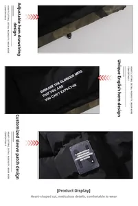 Detail view of adjustable drawstring hem with white slogan and embroidered sleeve patch