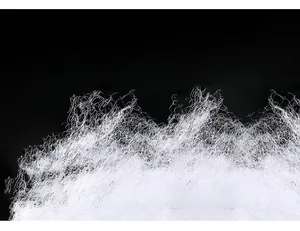 Dettaglio dell'imbottitura in cotone simile alla seta bianca per piumini invernali
