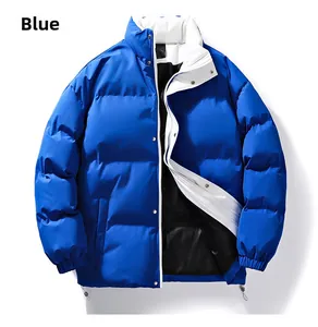 Blue puffer jacket details showing stand-up collar and white lining accents