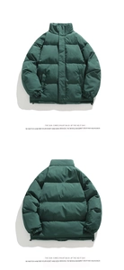 Flat lay of men's dark green puffer jacket with stand collar and adjustable drawstring hem