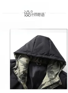 Close-up of winter hooded jacket with camo lining and 32K printed graphic on hood