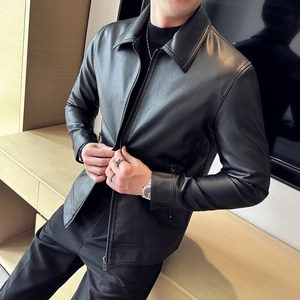 Detail view of men's slim fit black PU leather blazer with lapel and zipper sleeves