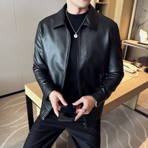 Detail of premium black PU leather jacket featuring classic lapels and sleek metal zipper
