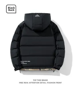 Rear view of black hooded puffer jacket with white graphic print and drawstring hem