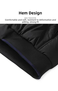 Macro shot of black ribbed hem with blue piping on winter jacket, soft and durable fabric