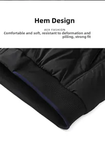Detailansicht des elastischen Rippsaums einer Herren-Winterjacke mit blauen Akzenten