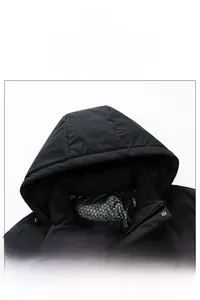 Detail view of hooded jacket with geometric patterned lining and durable zipper
