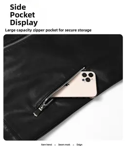 Detail view of large zipper pocket on black motorcycle jacket with a smartphone inside