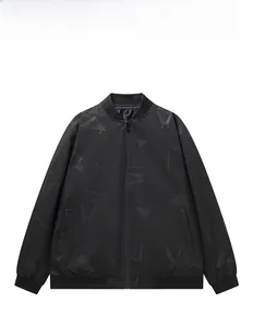 Close-up of black baseball collar jacket featuring geometric triangle pattern and ribbing