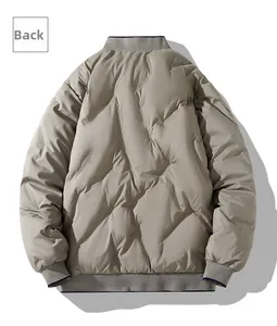 Rear view of taupe quilted winter jacket with ribbed cuffs and blue stripe details