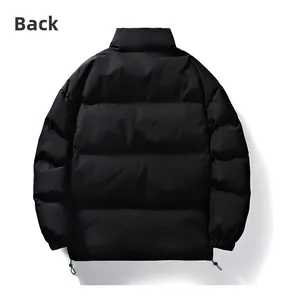 Rear view of black loose standing collar jacket with adjustable green drawstring hem