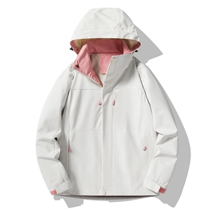 Women's outdoor hooded jacket with color-block design in cream and pink accents