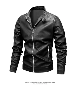 Detail of slim-fit black faux leather jacket with quilted shoulders and silver zippers