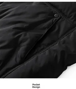 Close-up of quilted black jacket pocket detail with a metallic snap button fastener