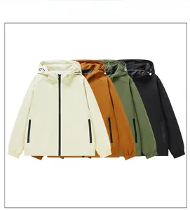 Flat lay of multiple color windbreakers featuring adjustable hoods and side zip pockets