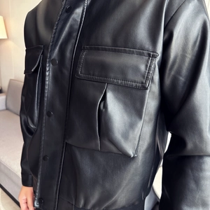 Men's black PU leather biker jacket with large utility pockets and snap buttons