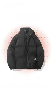 Detail of a black quilted winter jacket showing thermal insulation and windproof fabric