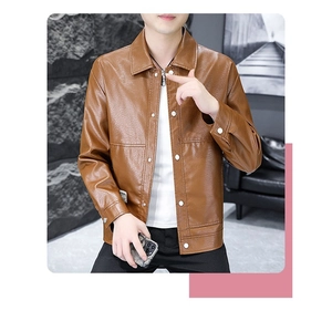 Close-up detail of caramel brown PU leather jacket with turnover collar and metal buttons