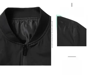 Detailed macro shot of ribbed collar and matte star-pattern texture on black bomber jacket