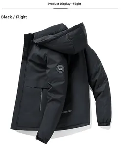 Detailed view of winter jacket with arm embroidery, zip pocket and velcro cuffs