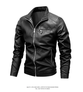 Detail of the stand-up collar and diamond-quilted shoulder stitching on a black leather jacket