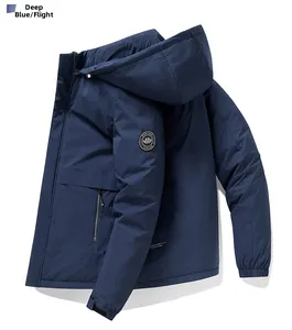 Detail of navy blue hooded puffer jacket with arm embroidery and elastic cuffs