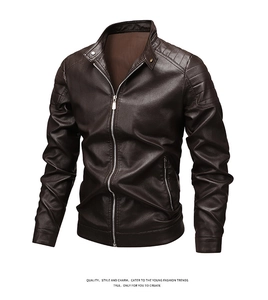 Detail of dark brown slim fit leather jacket featuring quilted shoulders and zip pockets