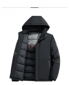Detail of winter hooded jacket with silver thermal reflective lining and arm badge