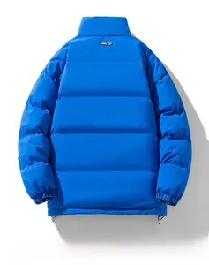 Close-up of vibrant blue padded jacket featuring classic horizontal quilting and high collar
