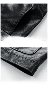 Close-up of litchi texture leather jacket featuring side pockets and precision stitching