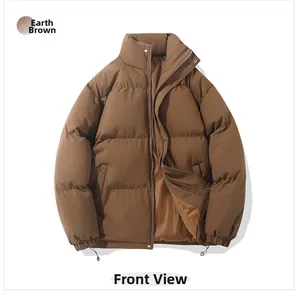 Close-up of brown oversized winter puffer jacket with high collar and horizontal quilting