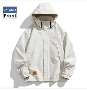 Detailed front view of a creamy white hooded windbreaker with pocket and leather patch