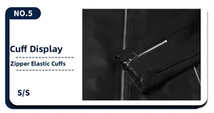 Detailed close-up of black leather jacket cuff featuring functional metal zipper detail
