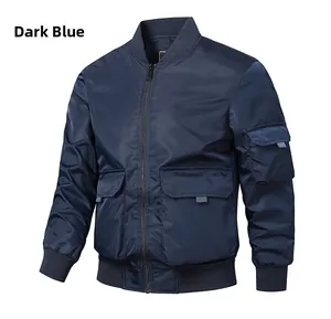 Detailed close-up of navy blue bomber jacket with ribbed collar and metallic zipper