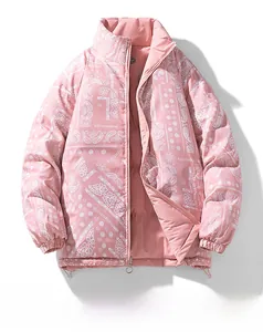 Detail of pink paisley quilted jacket featuring stand collar and metal zipper closure