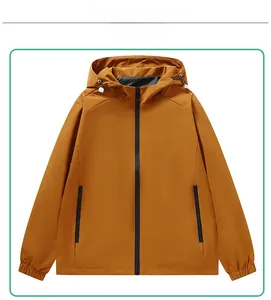 Detail view of mustard yellow windbreaker with adjustable hood and zippered pockets