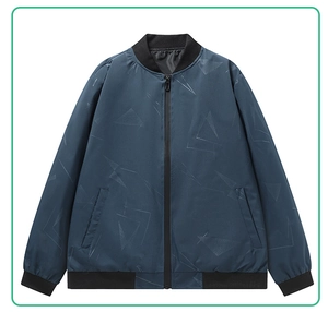 Detailed view of gray-blue bomber jacket with geometric pattern and black ribbed cuffs