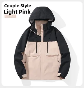 Detail view of light pink windproof hooded jacket with adjustable drawstrings and zip pockets