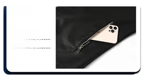 Detail view of the black leather jacket featuring functional silver metal zipper side pockets