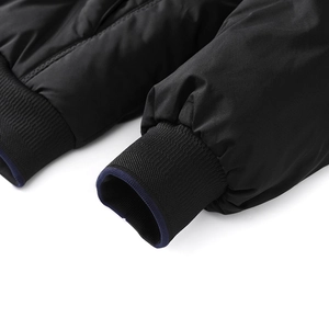 Men's winter puffer jacket with windproof fabric and ribbed knit cuffs in black finish