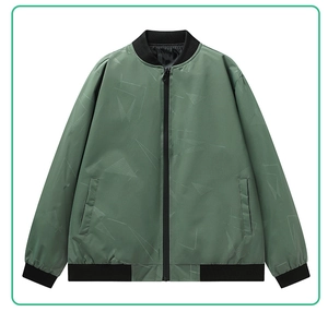 Detail of the elastic ribbed cuffs and geometric pattern on the green bomber jacket