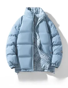 Detail of light blue puffer jacket showing the paisley pattern lining and high stand collar