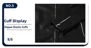 Detail of black motorcycle jacket sleeve showing metal zipper closure and leather texture