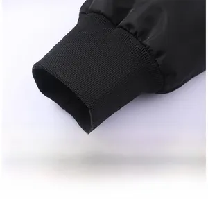 Close-up of windproof ribbed elastic cuffs on a black MA1 pilot bomber jacket sleeve