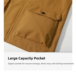 Close-up of waterproof outdoor jacket featuring large cargo pockets with snap button closure
