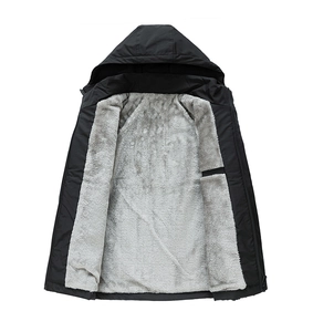 Detailed close-up showing the warm grey fleece lining of the black hooded outdoor jacket