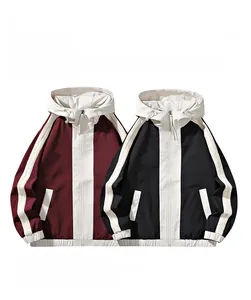 Detail of dark red and black hooded windbreaker jackets with contrast sleeve stripes