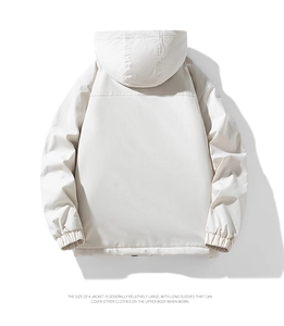 Detail of oversized ivory hooded jacket featuring dropped shoulders and elastic cuffs