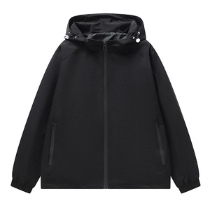 Waterproof oversized black hooded jacket with zipper pockets and adjustable drawstring